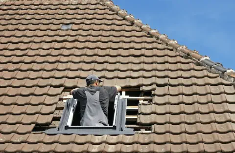 Pose de velux aux Touches